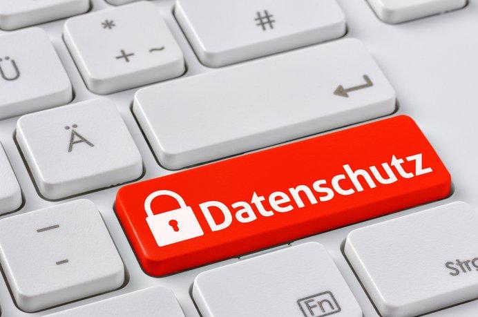 Datenschutz PC-Tastatur, Enter-Taste in rot mit weißer Aufschrift „Datenschutz“ und Vorhängeschlosssymbol